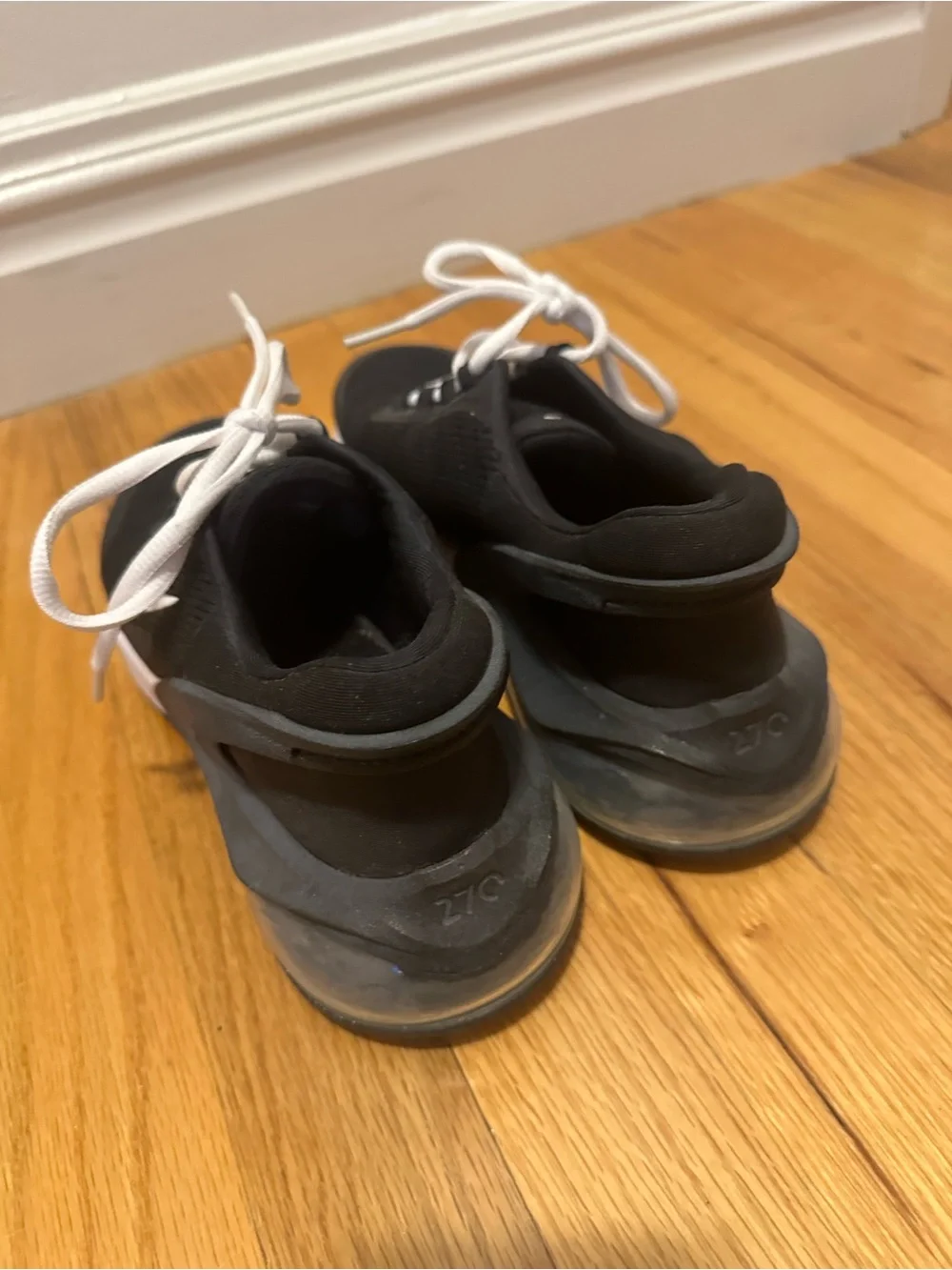 Nike women’s Black and White Sneakers